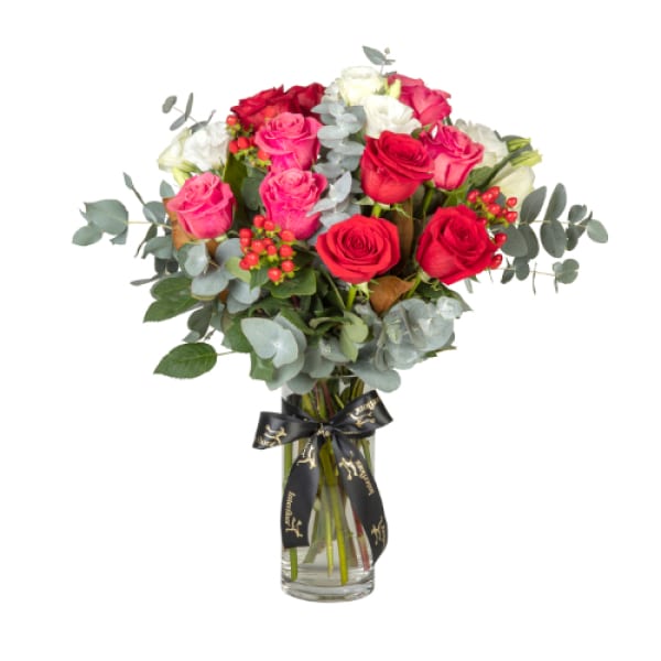 Mixed  Beautiful Roses Placed in a   Vase Arrangement